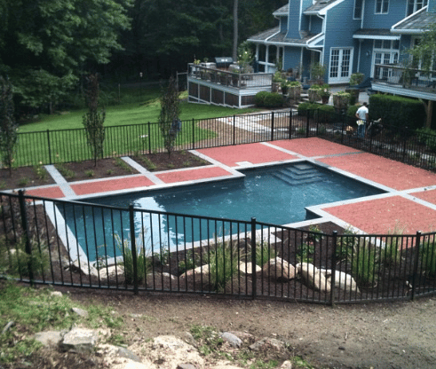 natural bluestone coping and red clay paver pool deck