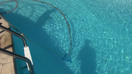 Pool Vacuum Cleaner Resting at the Bottom