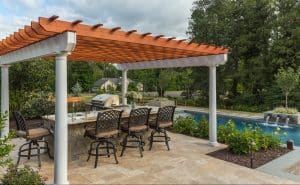 Outdoor kitchen with dining on patio