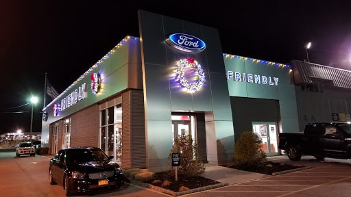 Ford dealership with christmas wreath and lights