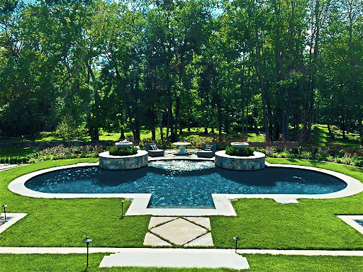 Centered view of pool with bird baths and small water fountain