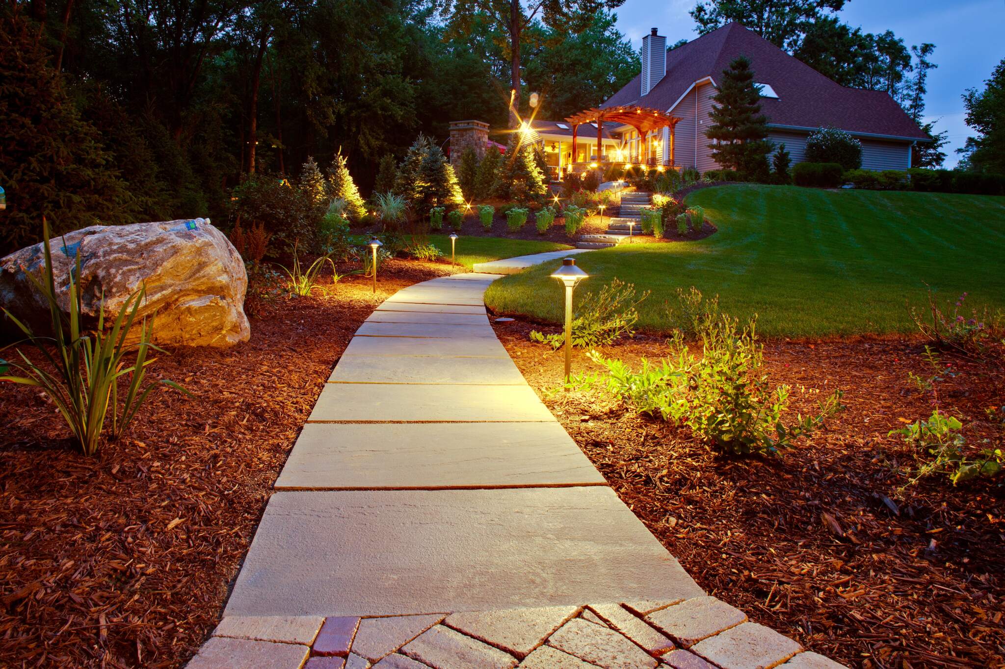 our walkways and paths enhance the overall landscape of your property