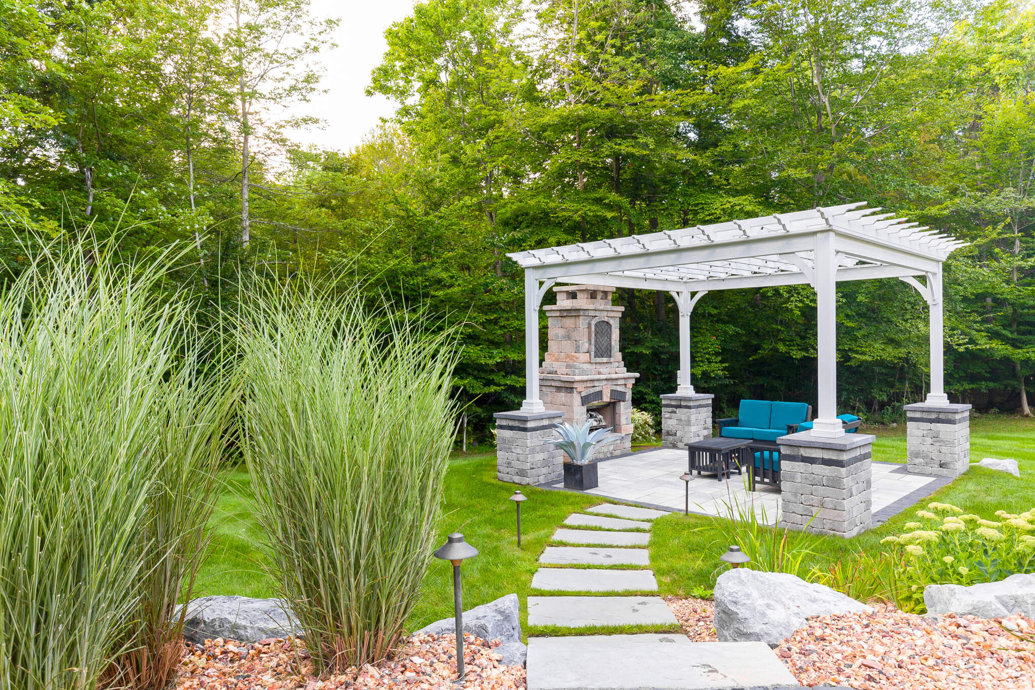 Image of beautiful landscaping in Putnam County, where homeowners can easily walk on stones to their gazebo