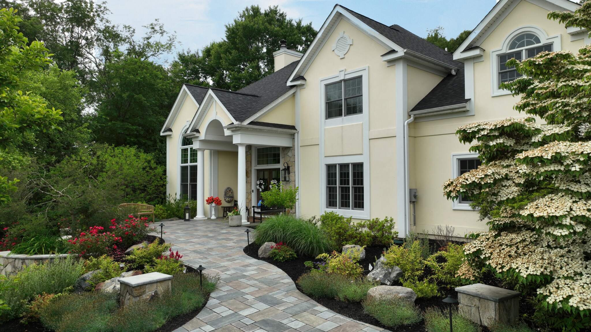 landscaped and hardscaped back door and patio scaled